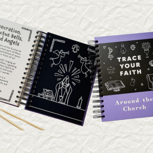 Notebook with 'Trace Your Faith Around the Church' text and illustrations and an open book with text on one page and a illustration on a scratch art page with two wooden styluses on a white crinkled paper background