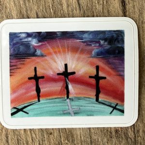 1.5x2 inch sticker depicting 3 crosses with red orange background