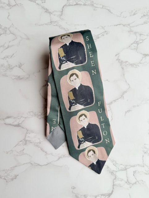 Necktie with image of Fulton Sheen speaking into a microphone on dark green background.