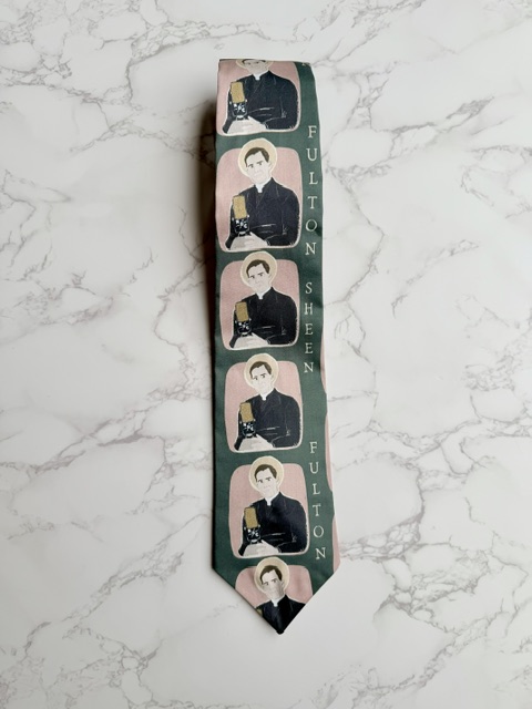 Necktie with image of Fulton Sheen speaking into a microphone on dark green